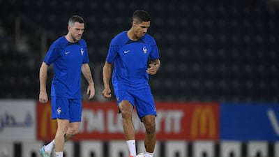 Raphael Varane takes part in a France training session at Al Janoub Stadium. AFP