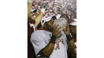 Mark Ingram, of Alabama, celebrates his team winning the American college football championship game last year. This year's game is between Auburn and Oregon. Marcio Jose Sanchez / AP Photo