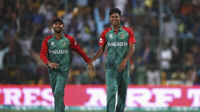 Mohammad Mithun and Mushfiqur Rahim of Bangladesh celebrate after taking the wicket of Mitchell Marsh of Australia during the ICC World Twenty20 match between Australia and Bangladesh at M. Chinnaswamy Stadium on March 21, 2016 in Bangalore. Ryan Pierse / Getty Images