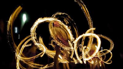 Fireball dancers create patterns with their torches during a Buddhist temple procession in Walpola. Fireball performers primarily had the task of lighting up streets by holding torches but later turned from light-givers to performers, their torches being re-crafted and their movements choreographed to produce an epic and unforgettable spectacle. Eranga Jayawardena / AP
