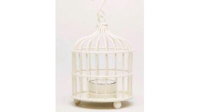 Bird cage candle holder. Tina Chang / The National