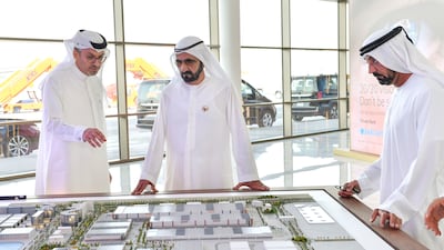 Sheikh Mohammed is shown a scale model of the Dubai Air City project in January 2019. Wam