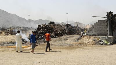 Some sections of the Friday Market shops were reduced to rubble. Jeffrey E Biteng / The National