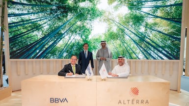 Dr Sultan Al Jaber, chairman of Alterra, and Carlos Vila, chairman of BBVA, at the signing of the deal in Abu Dhabi. Photo: Alterra