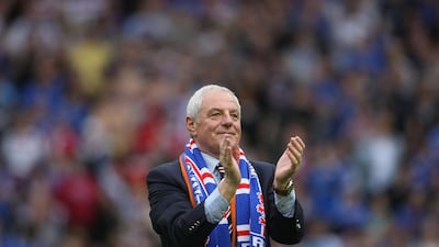 Rangers manager Walter Smith applauds the fans during the victory parade at Ibrox Stadium on May 24, 2009. PA
