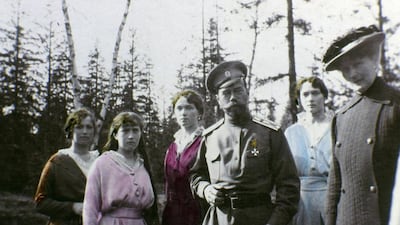 Tsar Nicholas II with daughters, left to 2nd right, Maria, Anastasia, Olga and Tatiana Romanov. They were executed by Bolsheviks on July 17, 1918. Laski Diffusion / Getty Images