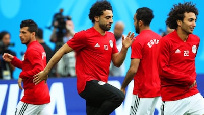 Egypt's Mohamed Salah, centre, and his teammates attend a training session in Saint Petersburg. Tolga Bozoglu / EPA