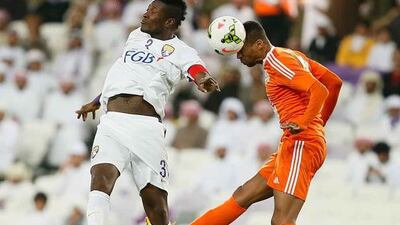 Asamoah Gyan, left, is five goals away from being the record goal scorer by a foreign player in the Arabian Gulf League. Anas Kanni / Al Ittihad