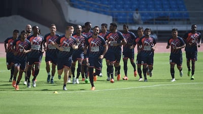 Delhi Dynamos FC players jog during a training session at the Jawaharlal Nehru Stadium on Wednesday ahead of the weekend's start to the 2015 Indian Super League tournament. Money Sharma/ AFP / September 30, 2015
