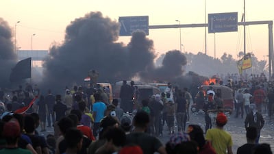 People hold an anti-government protest in Baghdad, Iraq. REUTERS