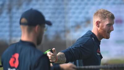England's Ben Stokes does some stretches. AFP