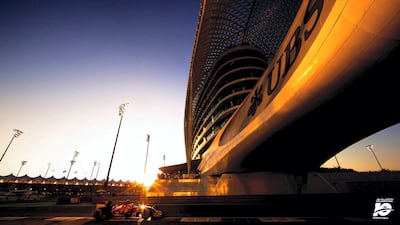 Kimi Raikkonen heads underneath the Yas Abu Dhabi during the 2014 Abu Dhabi Grand Prix. This is a tricky shot to shoot as the photographer - due to the surrounding fences - is unable to pan the camera with the motion of the car. Capturing the setting sun and a perfect starburst highlight off the Ferrari only adds to my happiness with the picture you see here.
