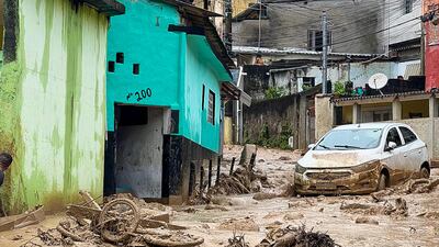 This handout picture released by Sao Sebastiao City Hall shows the damage caused by heavy rains in the municipality of Sao Sebastiao, north coast of the state of Sao Paulo, Brazil, on February 19, 2023. - A strong storm with a "record" amount of rain caused at least 19 deaths from floods and landslides during the carnival weekend in several towns in the state of Sao Paulo, authorities reported on Sunday. (Photo by NELSON ALMEIDA / Sao Sebastiao City Hall / AFP) / RESTRICTED TO EDITORIAL USE - MANDATORY CREDIT "AFP PHOTO / SAO SEBASTIAO CITY HALL / DANIELA ANDRADE" - NO MARKETING NO ADVERTISING CAMPAIGNS - DISTRIBUTED AS A SERVICE TO CLIENTS