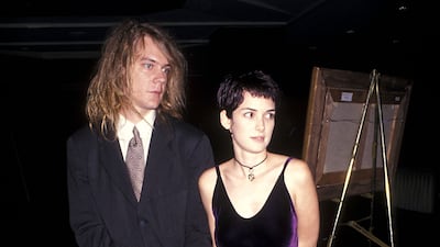 Singer Dave Pirner of Soul Asylum and Winona Ryder, in a deep purple velvet dress attend 'The Age of Innocence' New York City premiere on September 13, 1993 at the Ziegfeld Theatre. Getty
