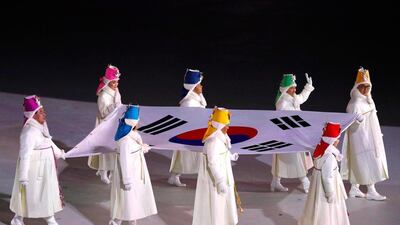 The South Korean flag is paraded during the opening ceremony. Phil Noble / Reuters