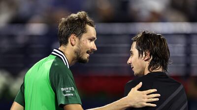Russia's Daniil Medvedev with Kazakhstan's Alexander Shevchenko after winning their round of 32 match. Reuters