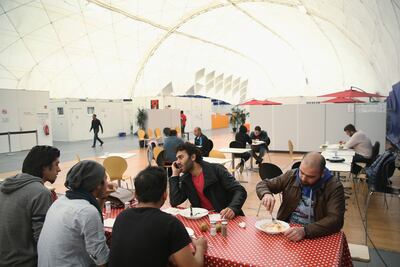 Syrians were eating and sleeping at temporary refugee sites in Berlin after many had arrived in 2015, fleeing civil war. Getty Images