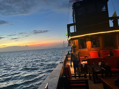 Sunset off Koh Samui on Red Baron cruise, a relatively affordable family experience. Photo: Christine Harding