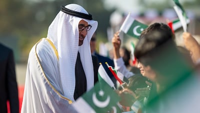 Sheikh Mohamed greets children during an official reception. Hamad Al Kaabi / UAE Presidential Court