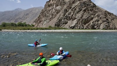 Three foreign tourists kayak along the Panjshir River in Panjshir province, north of the Afghan capital, Kabul, on July 17, 2016. Massoud Hossaini/AP Photos