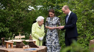 Queen Elizabeth is shown around 'Back to Nature' by Prince William and his wife Catherine at the Chelsea Flower Show in 2019. Getty Images