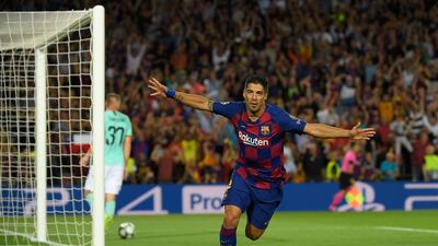 Barcelona's Luis Suarez celebrates after scoring the second goal during the UEFA Champions League Group F match against Inter Milan at Camp Nou in 2019. AFP