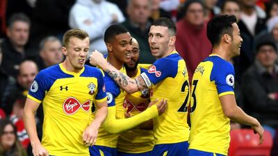 Yan Valery of Southampton celebrates after scoring his team's first goal with his teammates. Getty Images