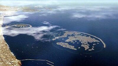 An aerial view of The World" and "Palm" islands off the coast of Dubai. AFP PHOTO