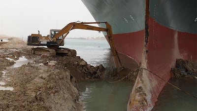 Abdallah Abdelgawad works with his excavator to free the ship's hull. Courtesy of Abdellah Abdelgawad