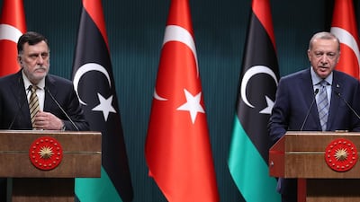Turkish President Recep Tayyip Erdogan, right, and Libyan Prime Minister Fayez Al Sarraj, left, hold a joint press conference at the Presidential Complex in Ankara. AFP