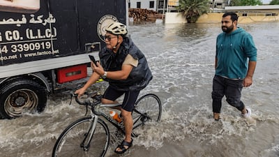 A waterlogged street in Al Quoz after heavy rain in Dubai and the northern emirates caused isolated flooding and disruption on roads. Antonie Robertson / The National