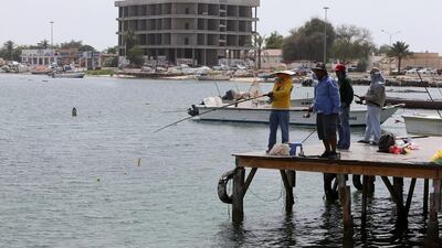 Gone fishin’: business owners in sleepy Umm Al Quwain say they have too few customers to make a profit. Pawan Singh / The National