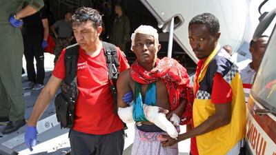 Turkish and Somali paramedics help a bombing victim at Mogadishu airport on October 16, 2017. Said Yusuf Warsame / EPA