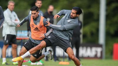 Emre Can tackles Suat Serdar during a training session at ADM-Sportpark ahead of Germany's Uefa Nations League group stage match against Spain. Getty Images