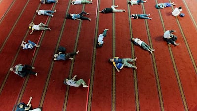 Muslim men rest inside Istiqlal mosque on the last day of Ramadan in Jakarta, Indonesia. Reuters