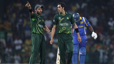 Shahid Afridi directs Umar Gul during the Pakistan v Sri Lanka 2011 World Cup match at the R. Premadasa Stadium on February 26, 2011 in Colombo, Sri Lanka. Getty