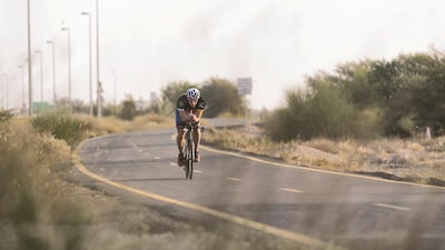 A cyclist on Al Qudra track starting his ride at 6am Reem Mohammed / The National