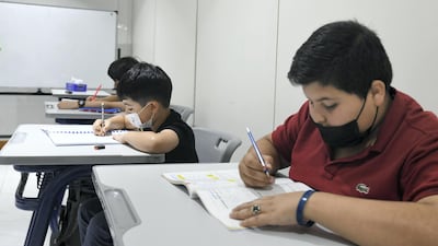 Young pupils study diligently at the centre