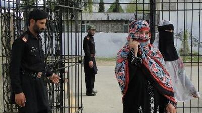 Badam Zari, second from right, leaves the election office after filing her candidacy for Parliament in Khar, the capital of the Pakistani tribal area of Bajur.