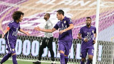 Al AIn's Douglas celebrates a goal with teammate Omar Abdulrahman during an Arabian Gulf League match against Al Jazira earlier this month. Photo Courtesy / Arshad Khan Aboobaker / AGL