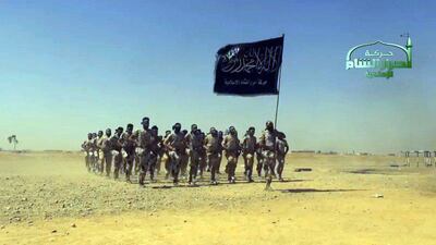 A still taken from a propaganda video uploaded on September 7, 2013 by Ahrar Al Sham. The group said on Wednesday it would not accept the outcome of Syrian opposition talks in Riyadh unless they include “cleansing Syrian territories of the Russian-Iranian occupation and sectarian militia supporting them”. Ahrar Al Sham/Handout/AFP Photo