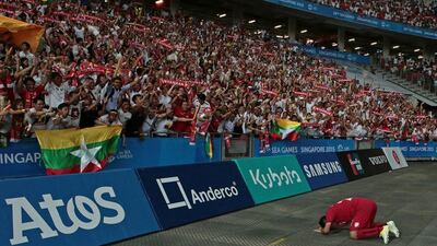 Myanmar's Ye Ko Oo celebrates during the team's semi-final win over Vietnam at the Southeast Asian Games football tournament on Saturday in Singapore. Action Images / Reuters / SEA Games Organising Committee / June 13, 2015