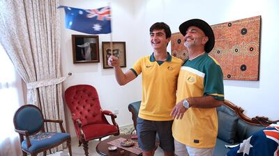 Mohanned Hourani and his 14-year-old son Ali, will be flying the flag for the Aussies, but both fans agree that if their team score just a single goal that would make their year. Fatima Al Marzooqi / The National