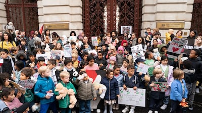 Parents and children lay cuddly toys at the entrance to the Foreign Office in London in protest at the loss of children's lives in Gaza. PA Wire