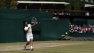 Novak Djokovic is shown during his training session on Saturday for Sunday's 2014 Wimbledon men's singles final. Jan Kruger / Getty Images