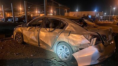 A damaged car at the Aramco oil plant in Jizan.