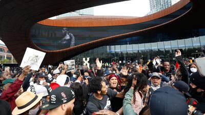 Fans sing outside the Barclays Centre. EPA