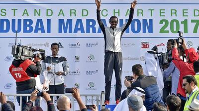 Ethiopian runner Tamirat Tola celebrates winning the men’s marathon in Dubai on January 20, 2017. Agence France-Presse