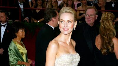 Naomi Watts, in Versace, attends the 76th Annual Academy Awards on February 29, 2004. EPA
