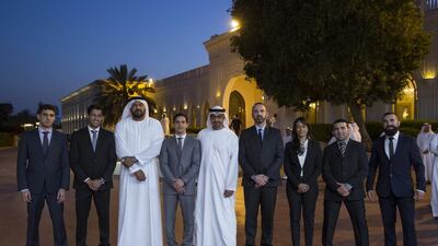 Sheikh Mohammed bin Zayed, Crown Prince of Abu Dhabi and Deputy Supreme Commander of the Armed Forces, stands for a photograph with referees of the Abu Dhabi World Professional Jiu-Jitsu Championship 2016, seen during a Sea Palace barza. Ryan Carter / Crown Prince Court - Abu Dhabi